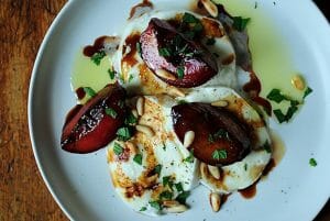 Buffalo Mozzarella with Balsamic Glazed Plums Pine Nuts and Mint