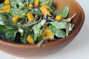 Mixed Green Salad with Mango, Sesame Seeds & Ginger Yogurt Dressing